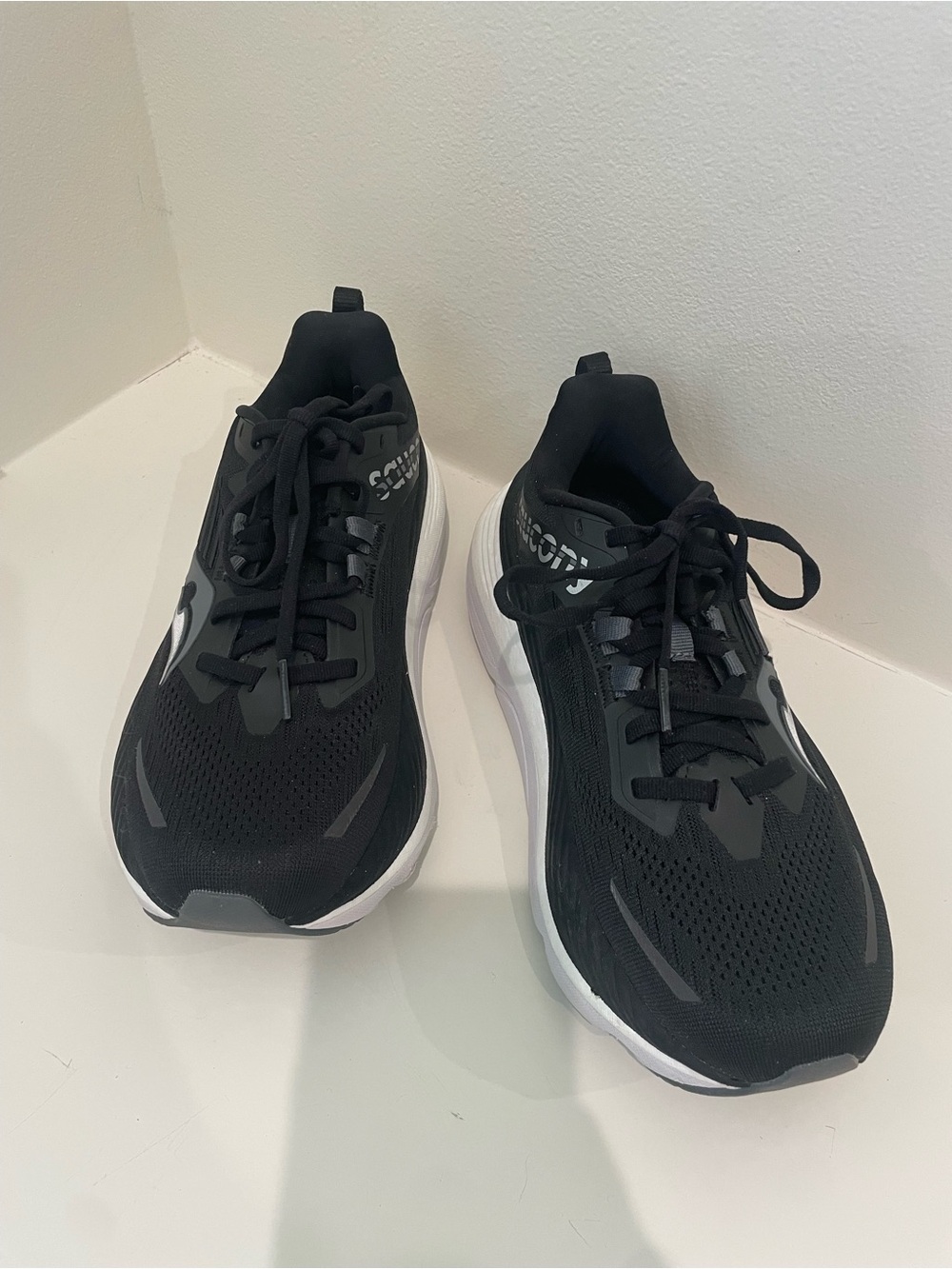 Women's Saucony Hurricane 24 Black Athletic Running Shoes with White Midsole